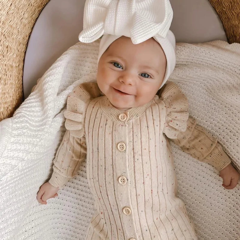 The Baby Girl Knitted Sleepsuit Romper and Bow