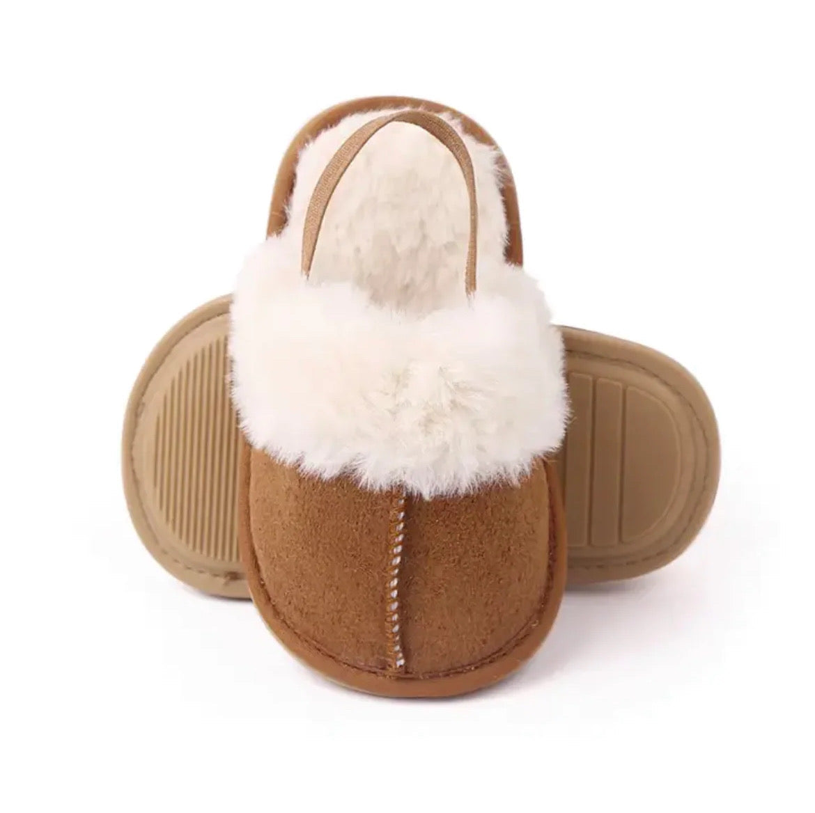 Les pantoufles en fourrure UGG 