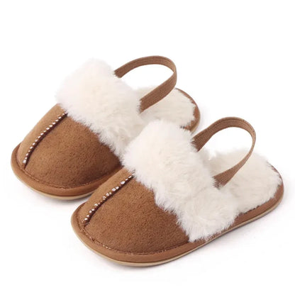 Les pantoufles en fourrure UGG 